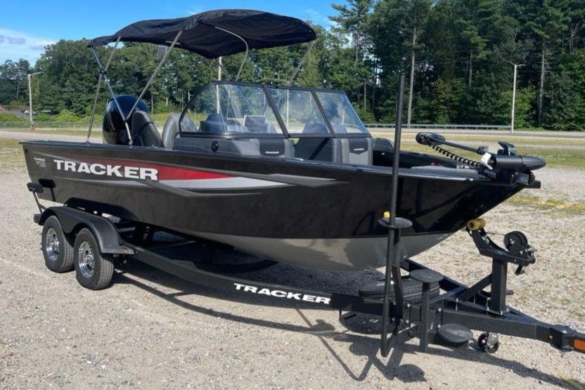 2026 Tracker Targa V-18 WT boat on trailer, parked outdoors.