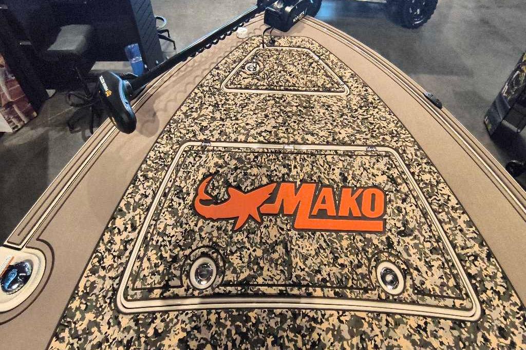 2026 Mako 18 Pro Skiff Backwater Edition with camo design and logo on deck.