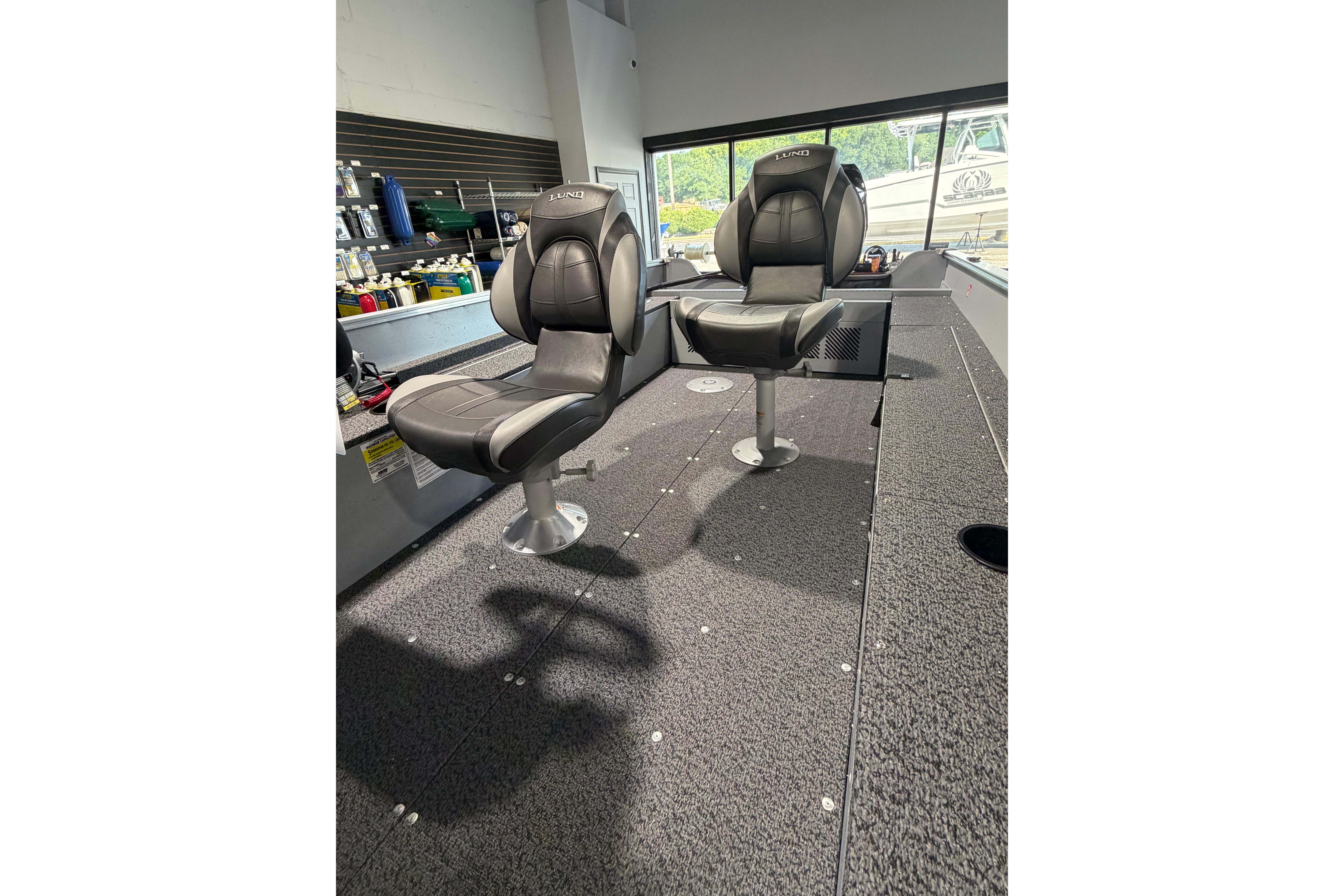 2027 Lund 1600 Fury SS boat interior with two cushioned seats.