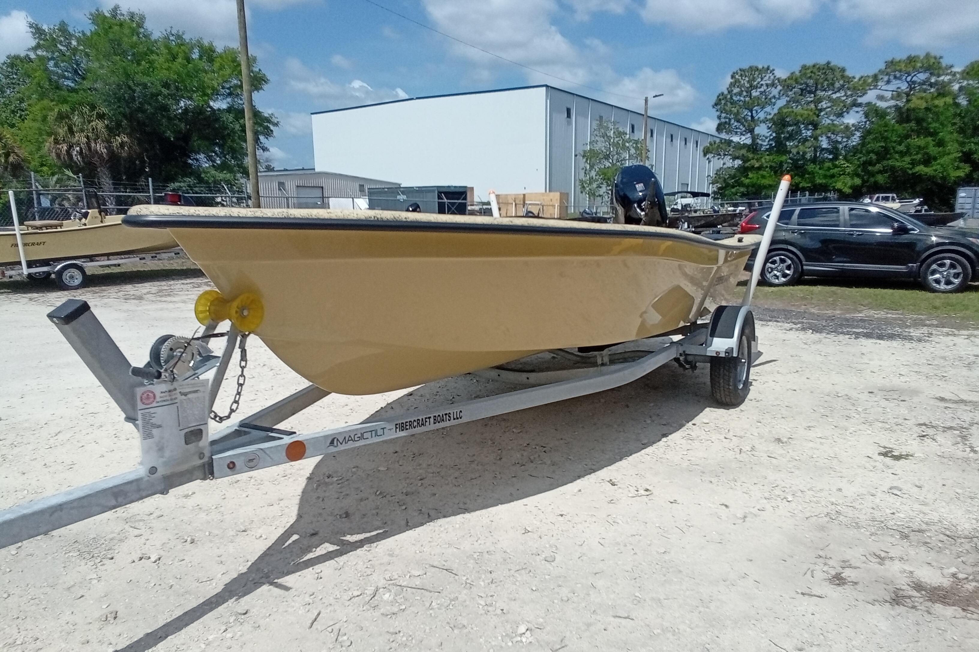 2025 Fibercraft F16 boat on trailer in outdoor setting.