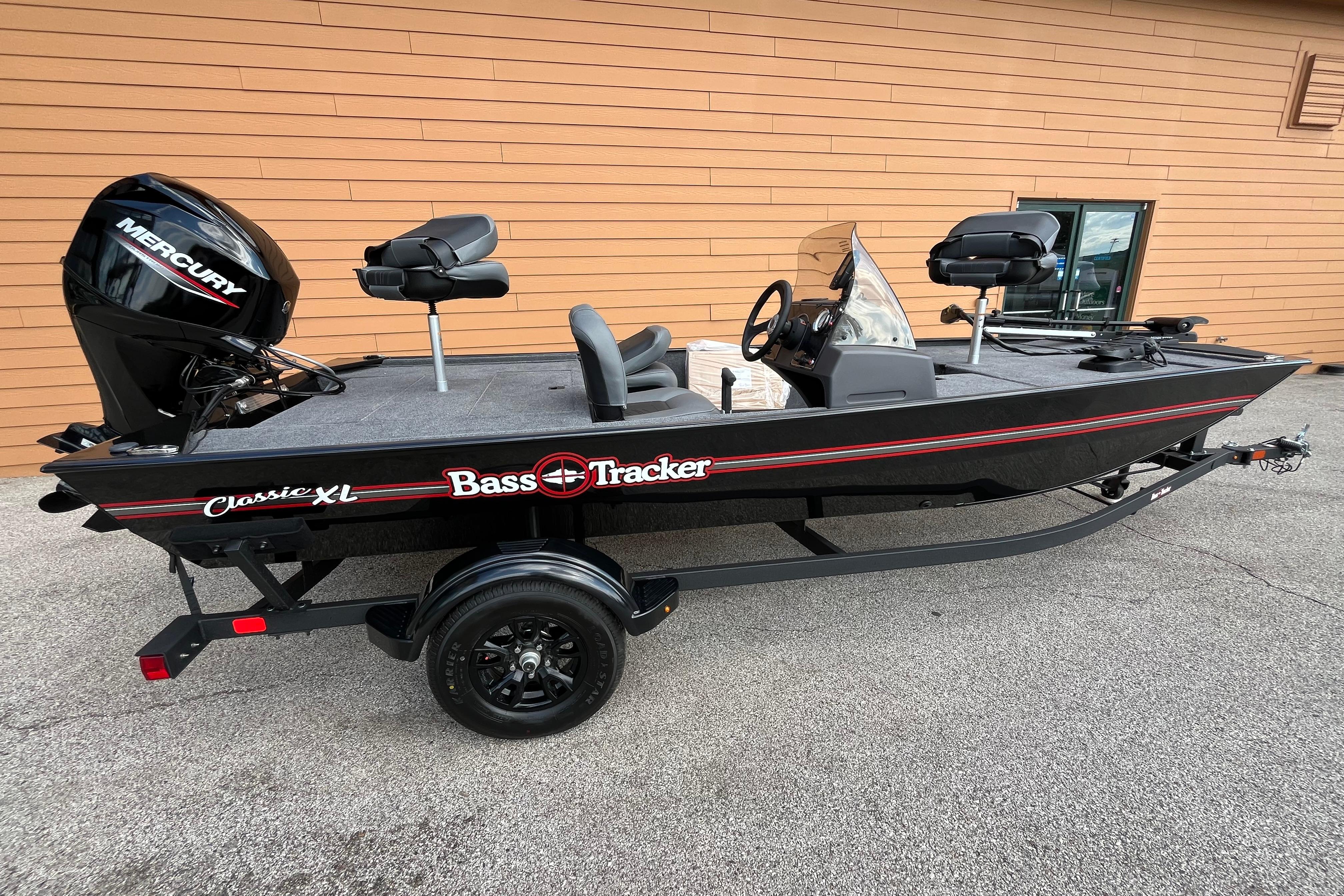 2026 Tracker Bass Tracker Classic XL boat with Mercury engine on trailer.