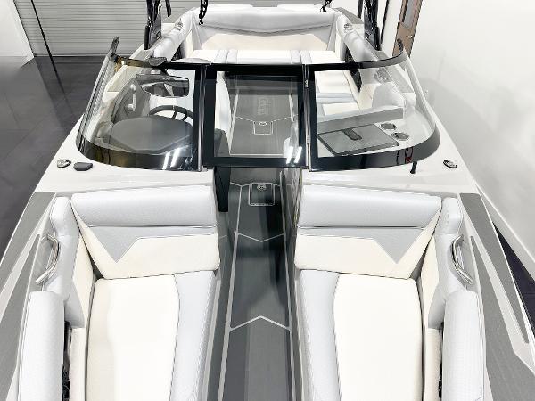 2025 Supreme S240 boat interior with sleek design and modern seating arrangement.