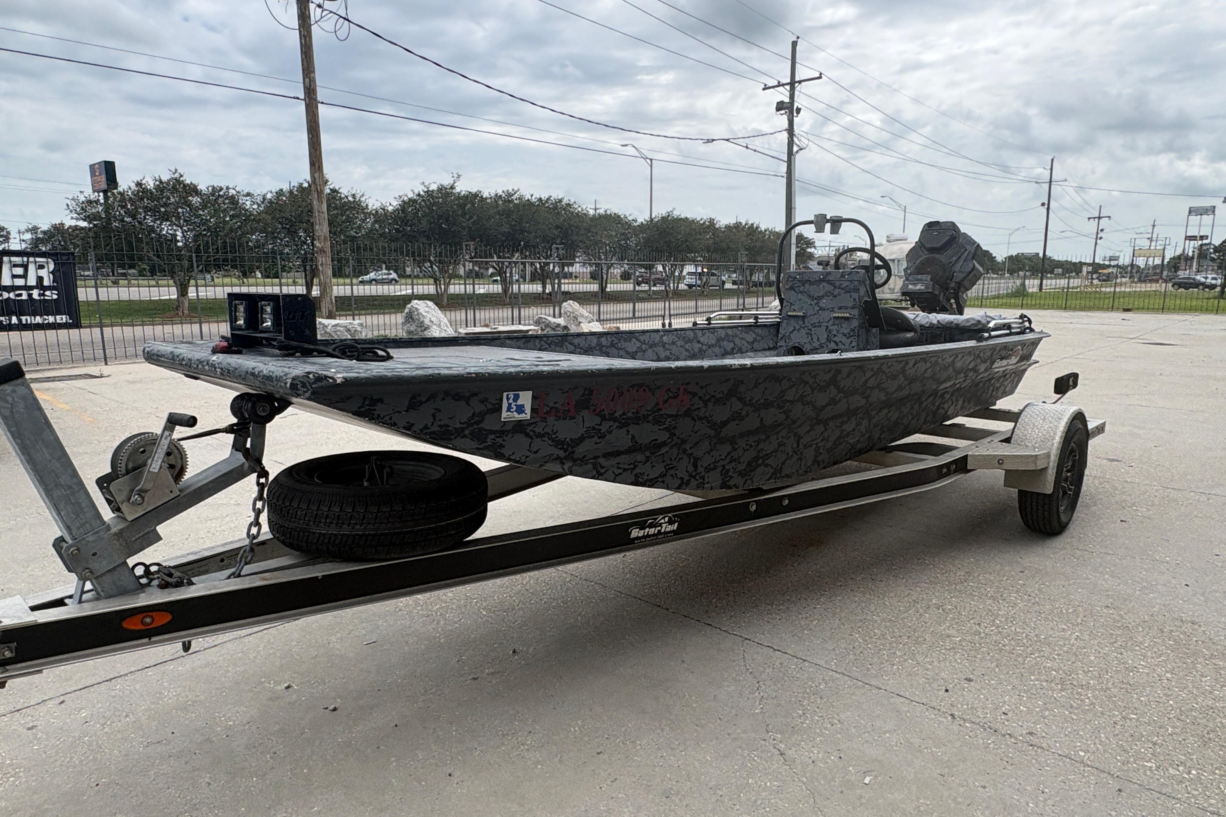2020 Gator Tail Extreme boat on trailer, parked outdoors, showcasing sleek design.