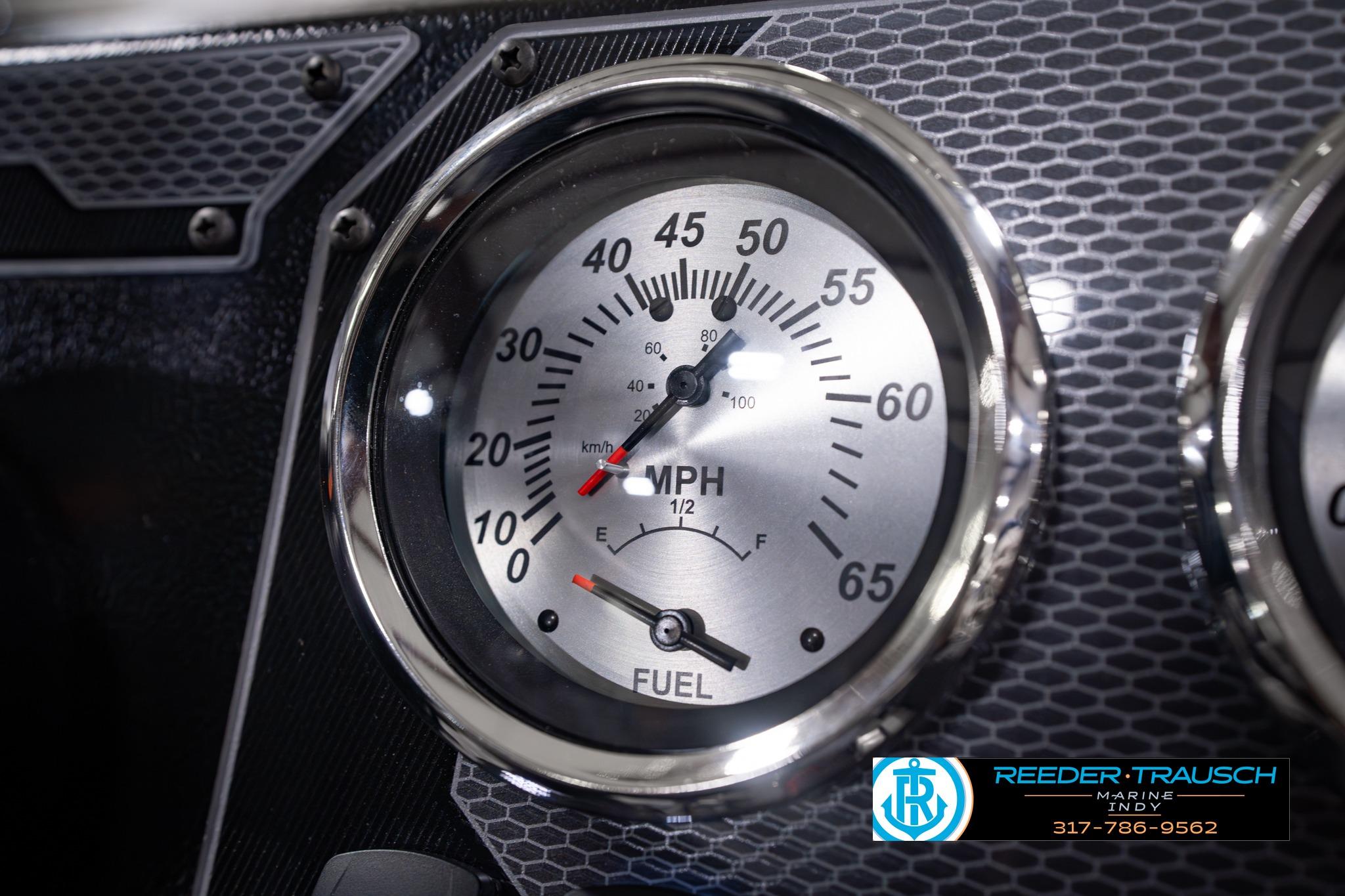 Close-up of 2026 Lund 1650 Rebel XL SS speedometer and fuel gauge on dashboard.