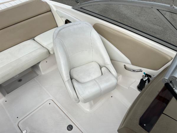 2013 Regal 1900 boat interior with white and beige seating.
