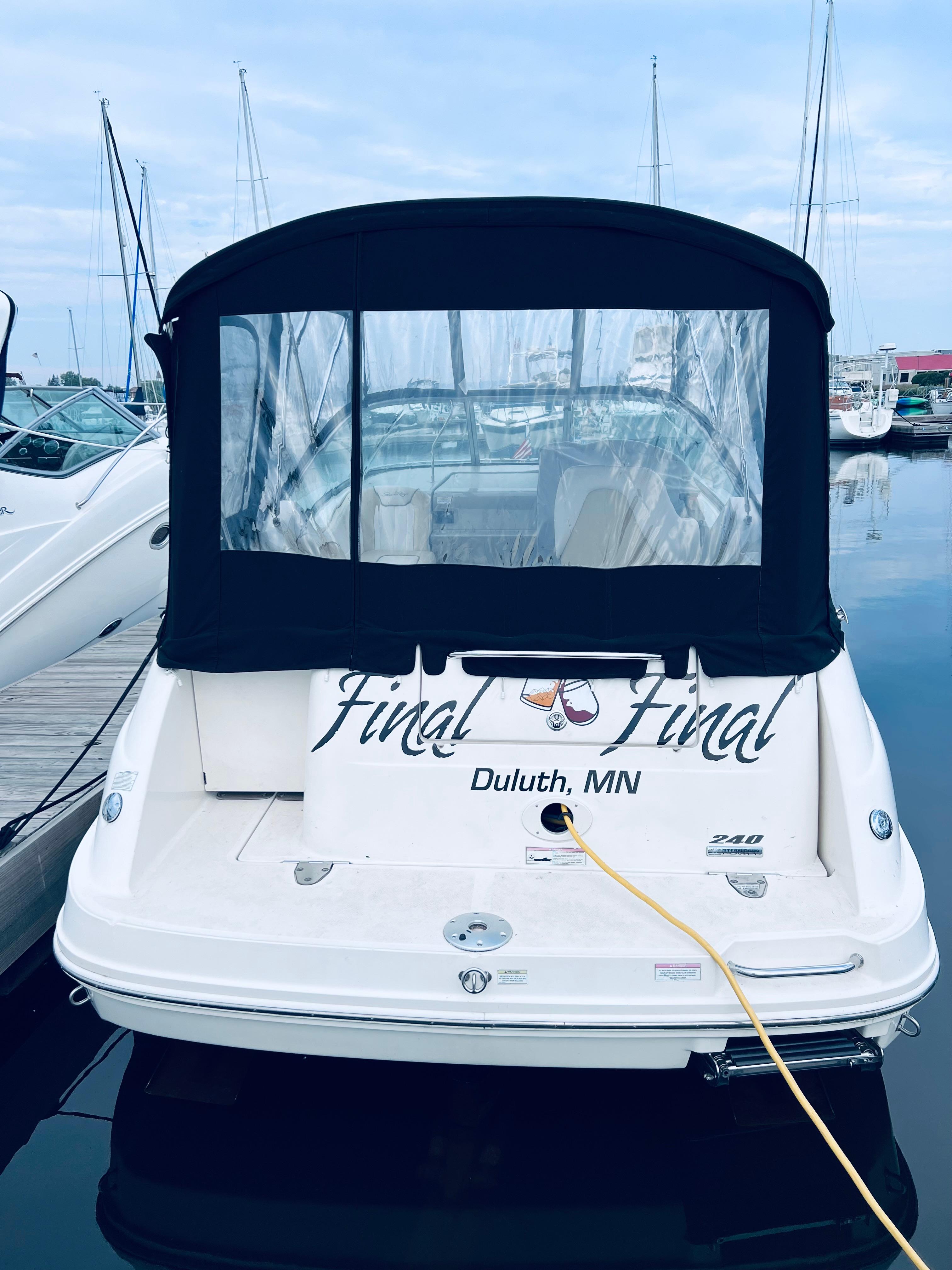 2012 Sea Ray 240 Sundancer boat docked in Duluth, MN marina.