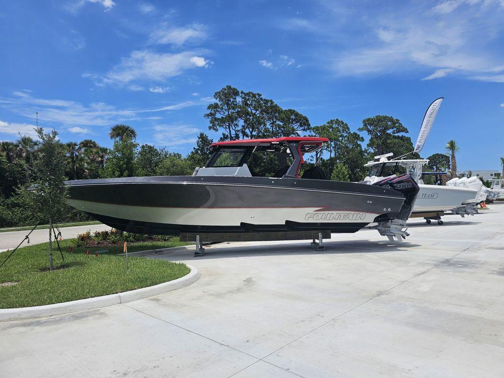 2025 Fountain 38 SCX boat displayed outdoors on a sunny day.
