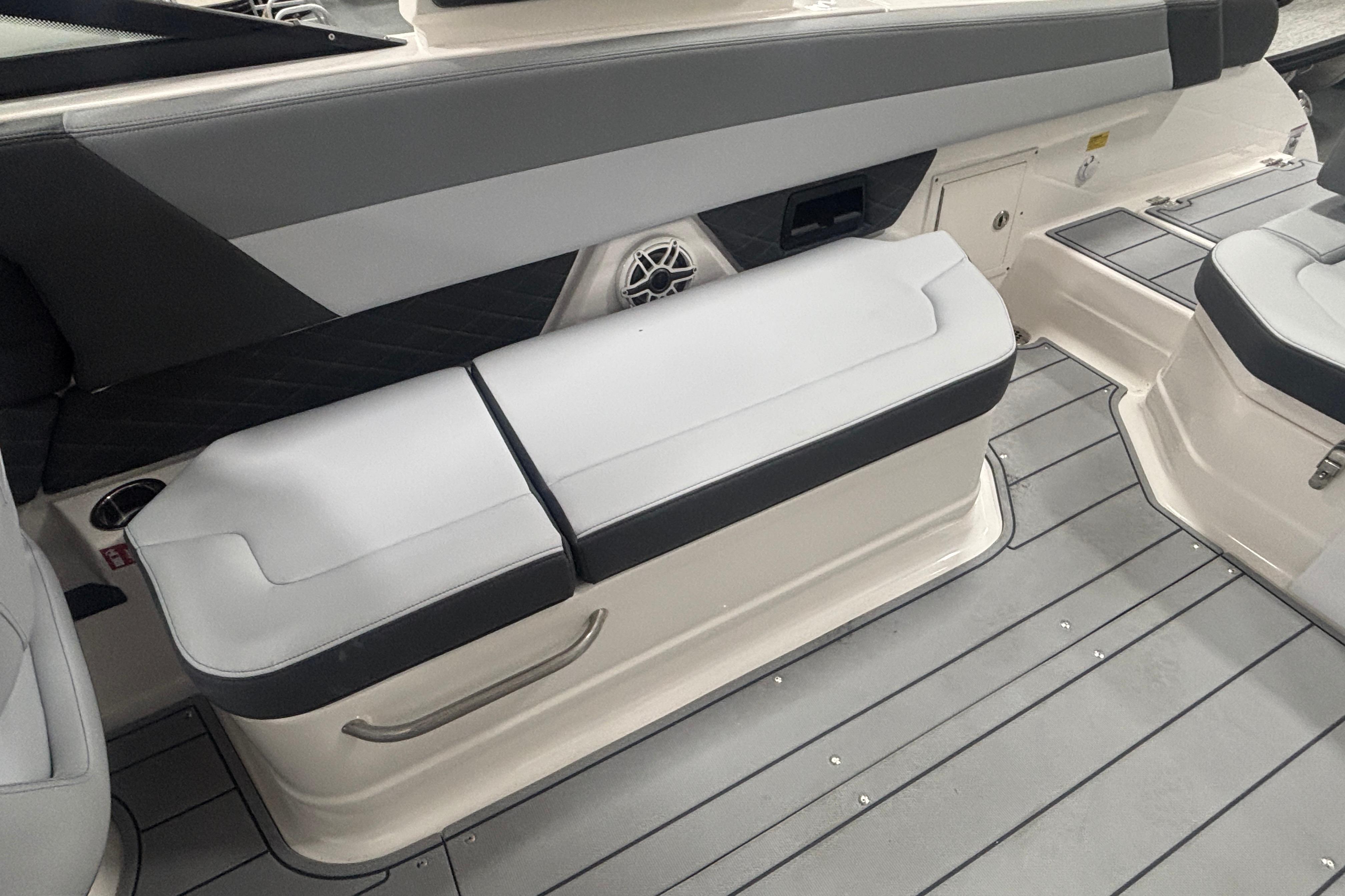 2026 Chaparral SSX 30 boat interior with gray seating and flooring.