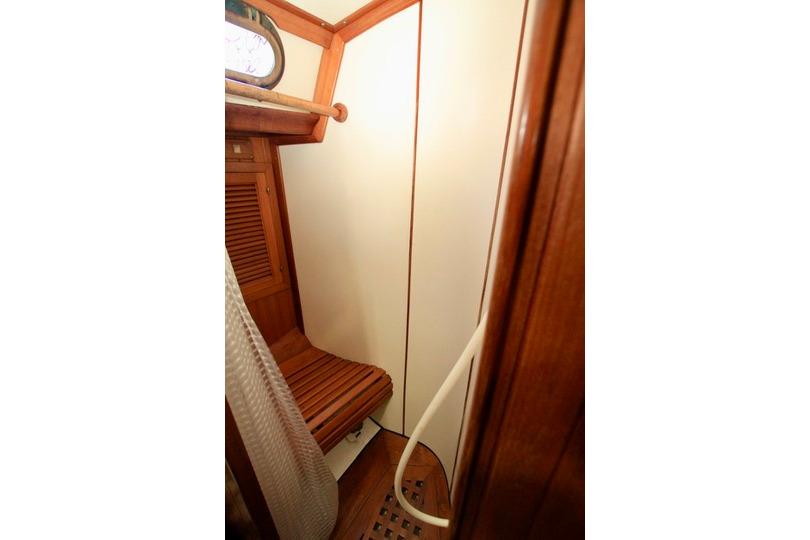 Interior of 1981 Ta-Shing Panda 40 sailboat, featuring wooden shower area.