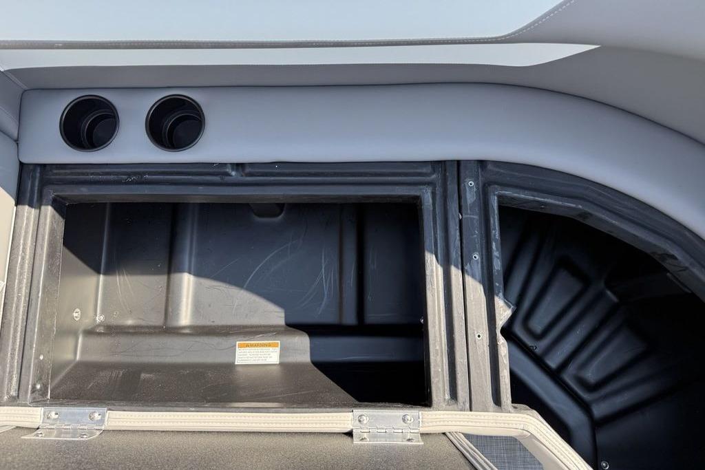 Interior storage compartment of 2026 Premier 220 Sunscape RF boat, featuring dual vents.