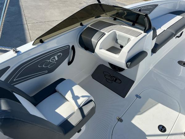 2024 Tahoe T21 boat interior with seating and steering console.