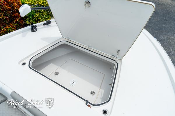 Open storage compartment on 2025 Caymas 281 HB boat deck.
