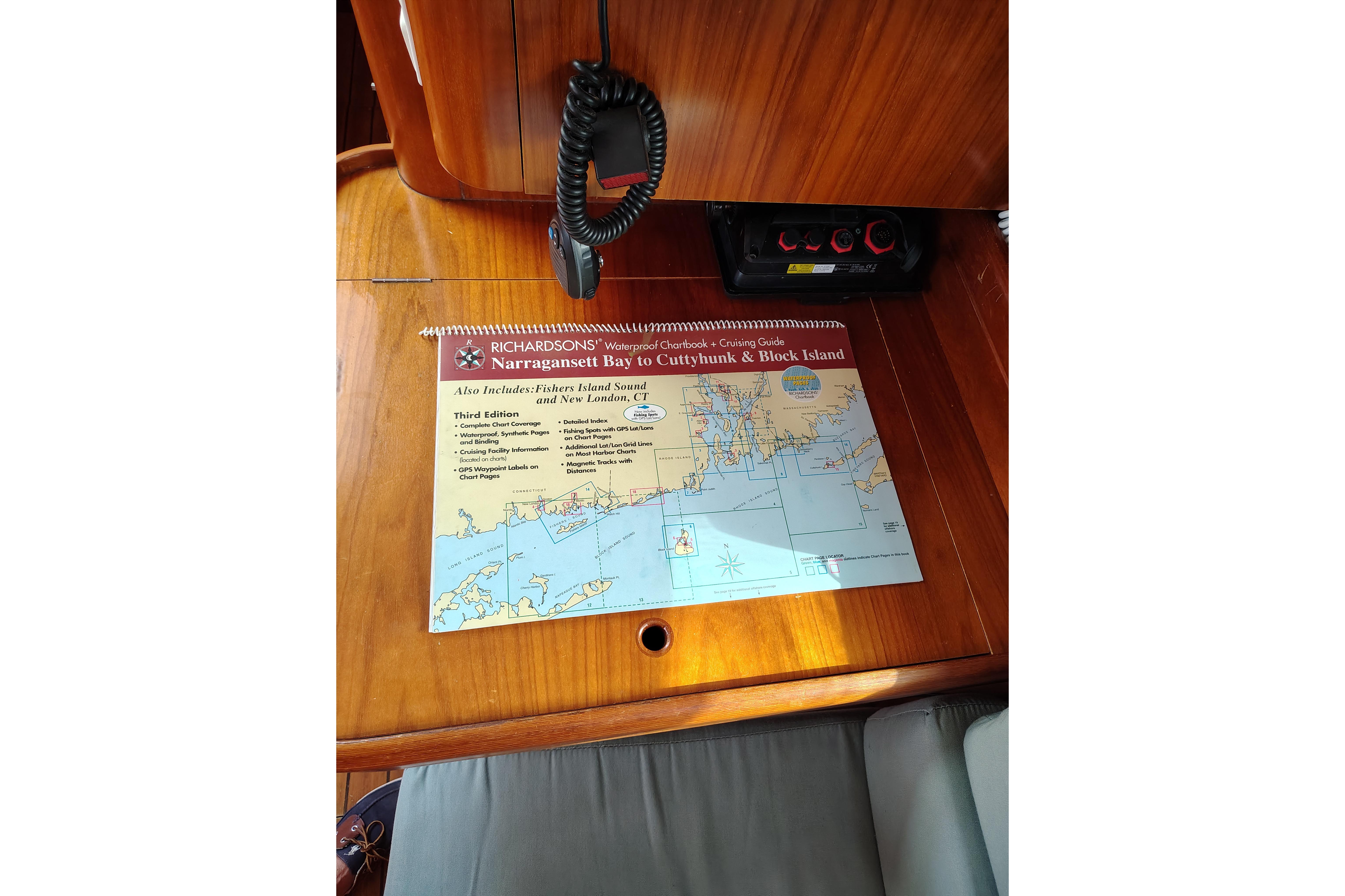 Chart table on 2001 Beneteau Oceanis 411 with Richardson's cruising guide.
