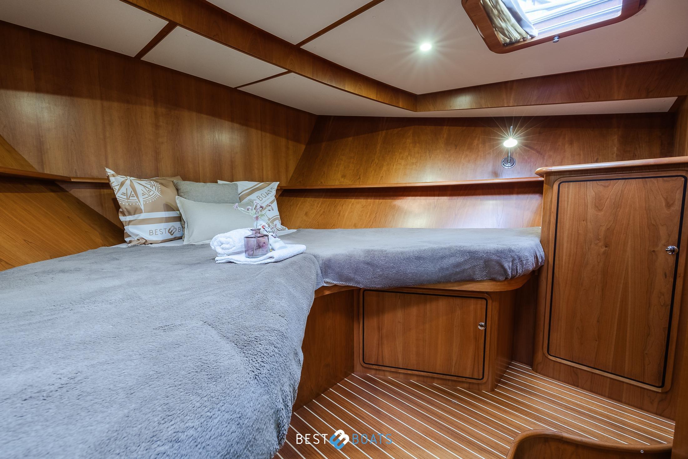 Cozy cabin interior of 2010 Linssen Grand Sturdy 470 AC Mark II Twin yacht.