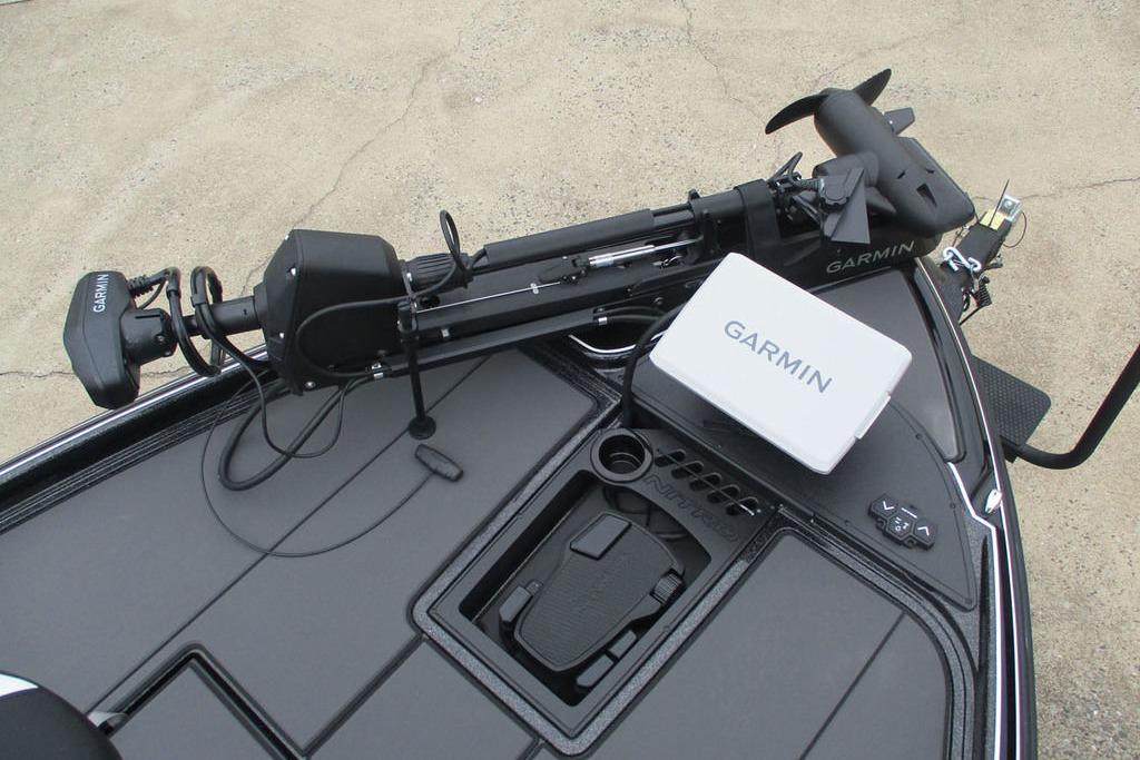 2026 Tracker Pro Guide V-16 WT boat with Garmin equipment on deck.