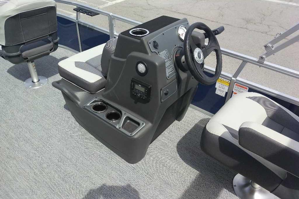 2026 Sun Tracker Bass Buggy 16 XL Select boat interior with steering console and seating.