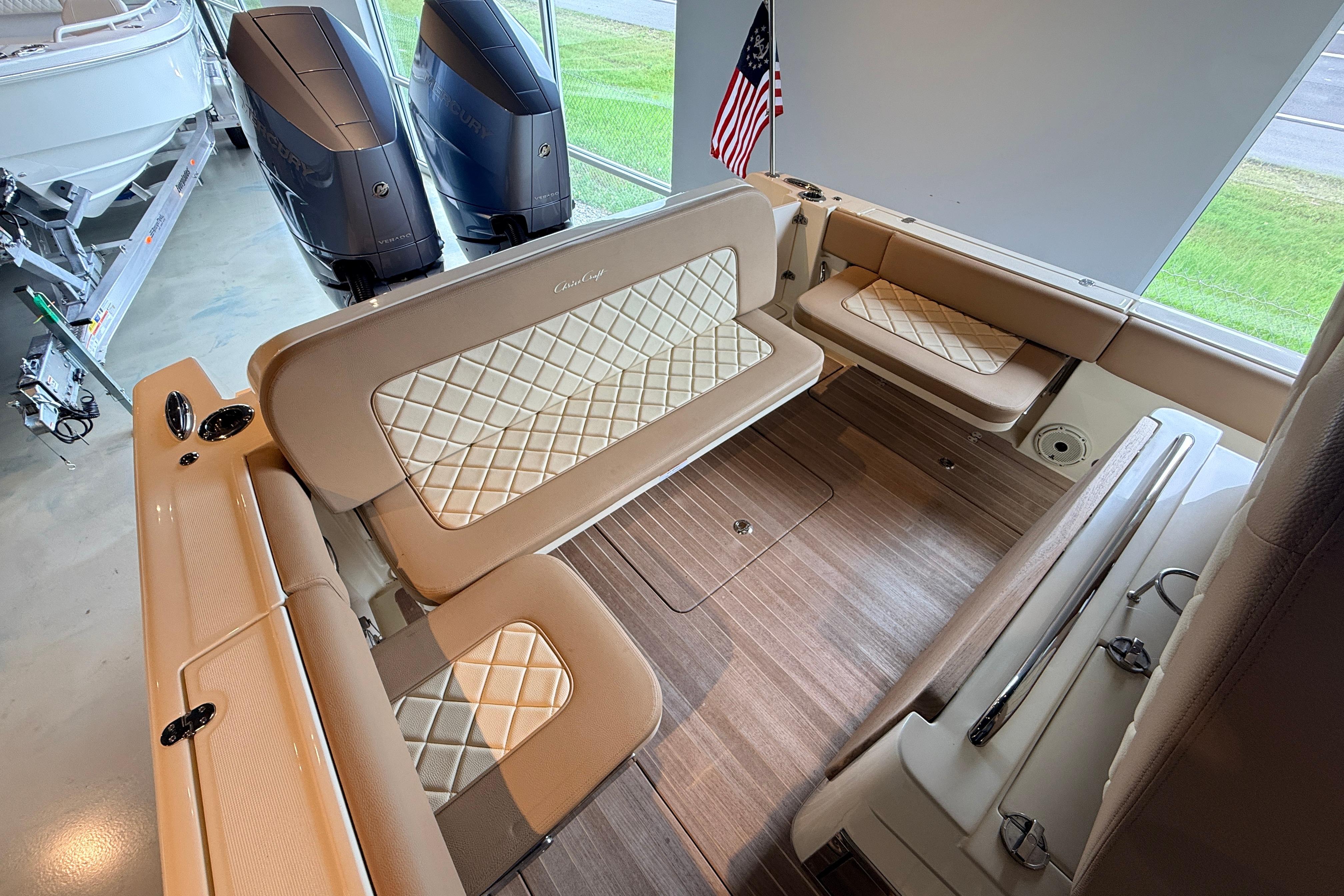 2024 Chris-Craft Catalina 30 interior with elegant seating and dual outboard engines.