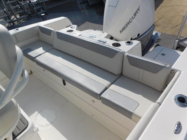 2025 Sailfish 232 CC boat interior with cushioned seating and Mercury engine.