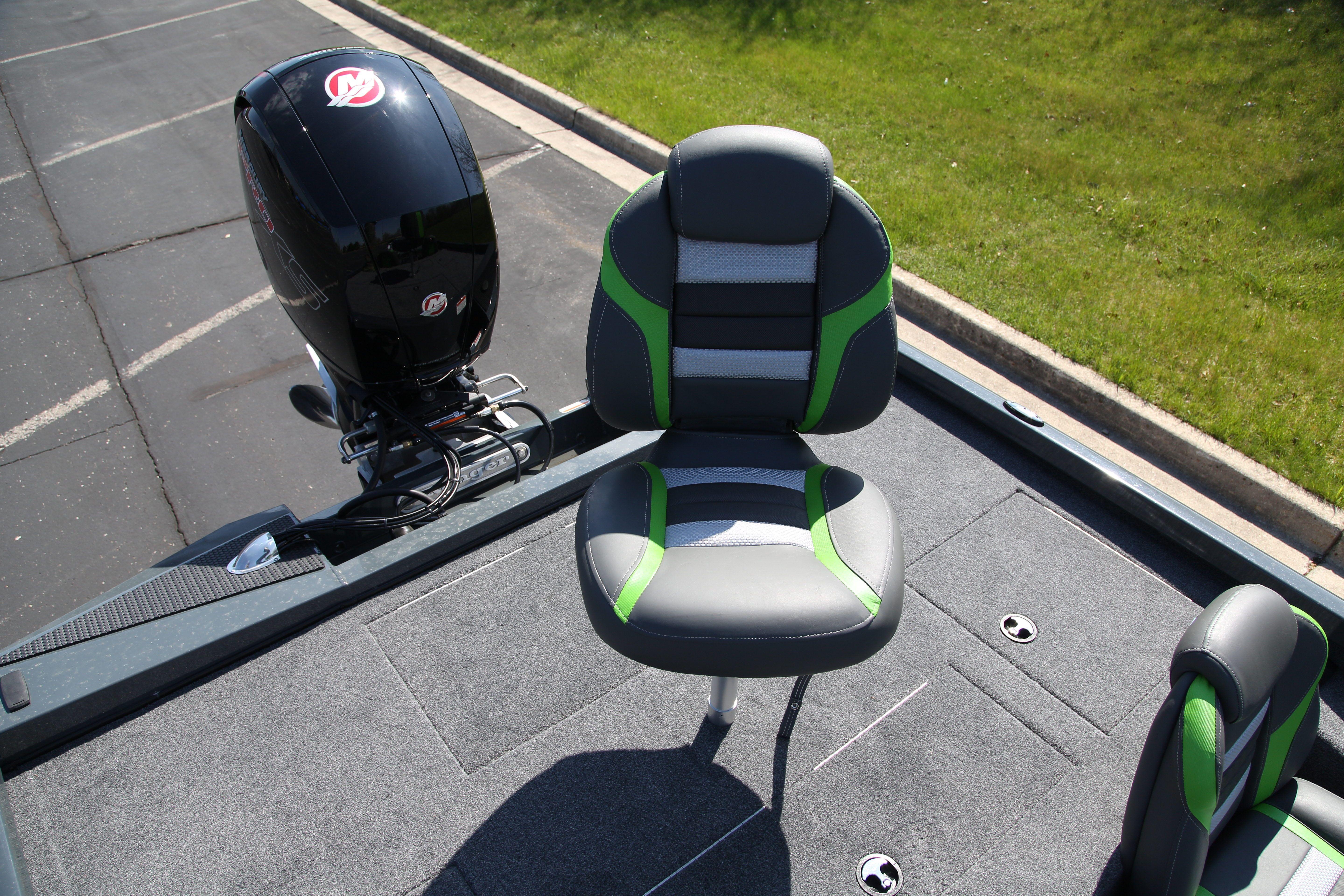 2026 Ranger RT198P boat with green-accented seat and powerful outboard motor.