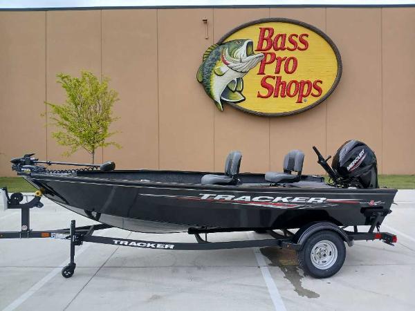 2025 Tracker Super Guide V-16 T boat at Bass Pro Shops display.