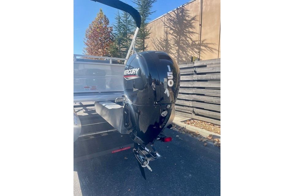 Outboard motor on a 2026 Sun Tracker Party Barge 22 RF DLX pontoon boat.