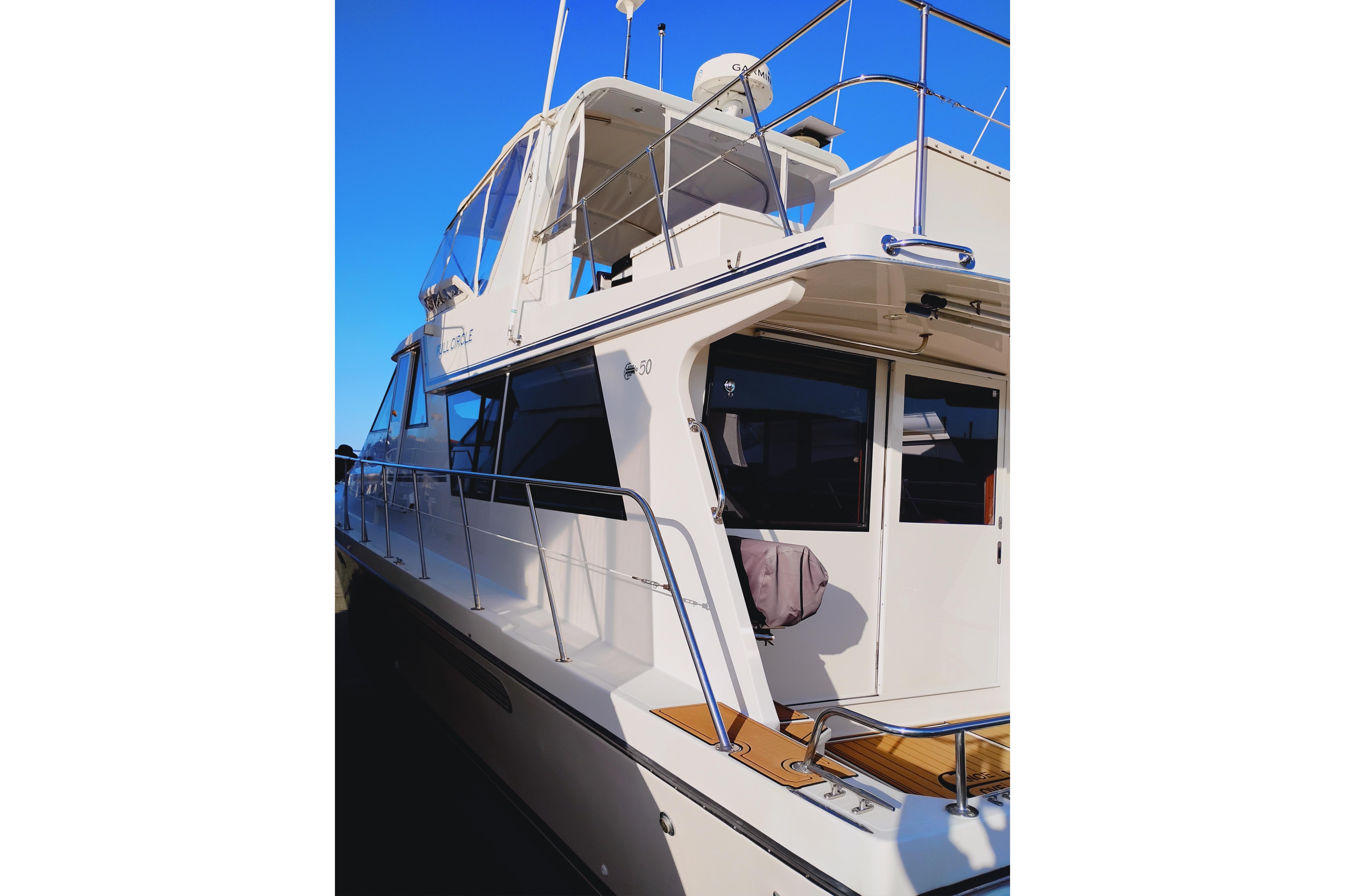 2002 Canoe Cove 50 Pilothouse Motor Yacht with sleek design and modern features.