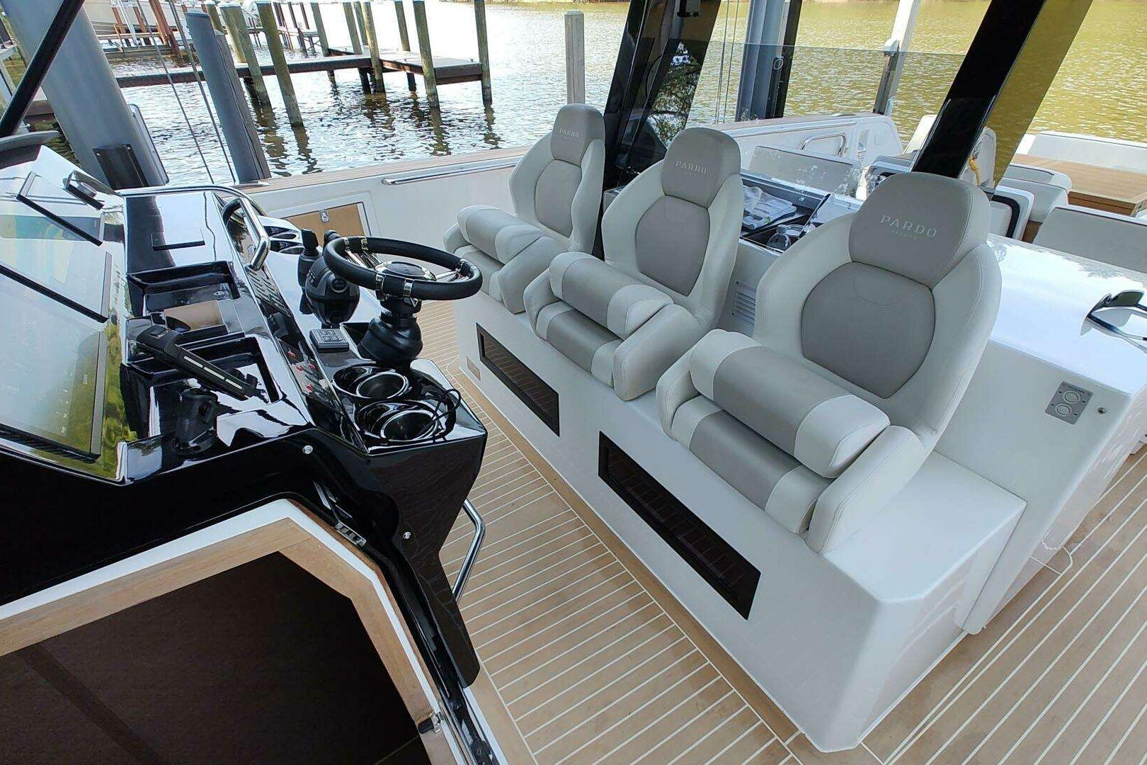 2023 Pardo Yachts P43 cockpit with luxurious seating and modern steering console.