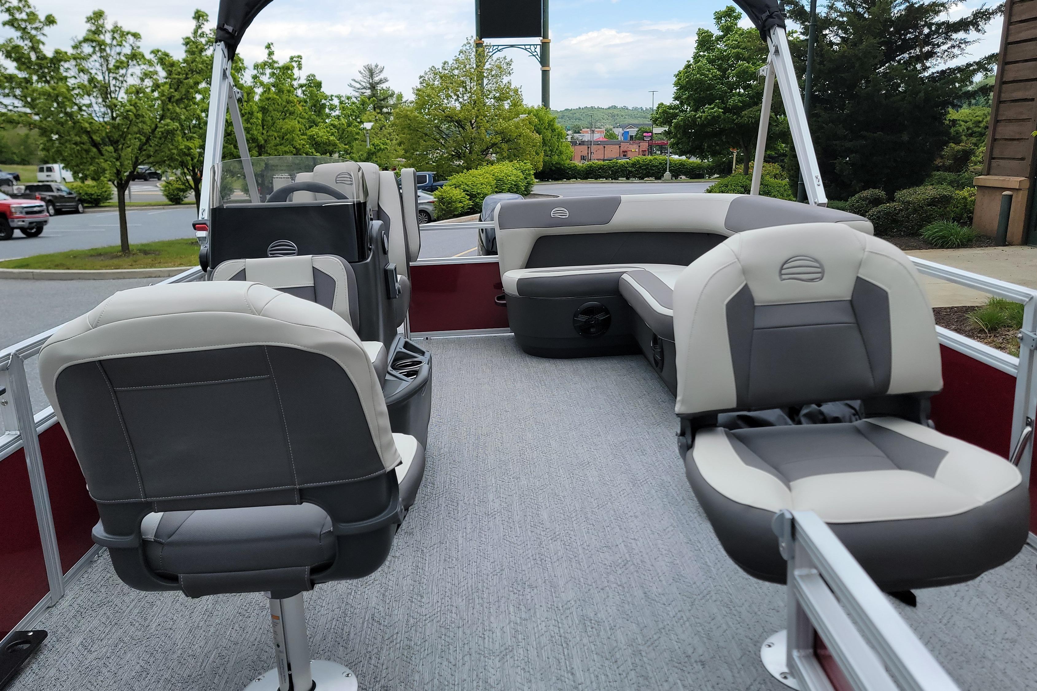 2026 Sun Tracker Bass Buggy 16 XL Select pontoon boat with spacious seating and modern design.