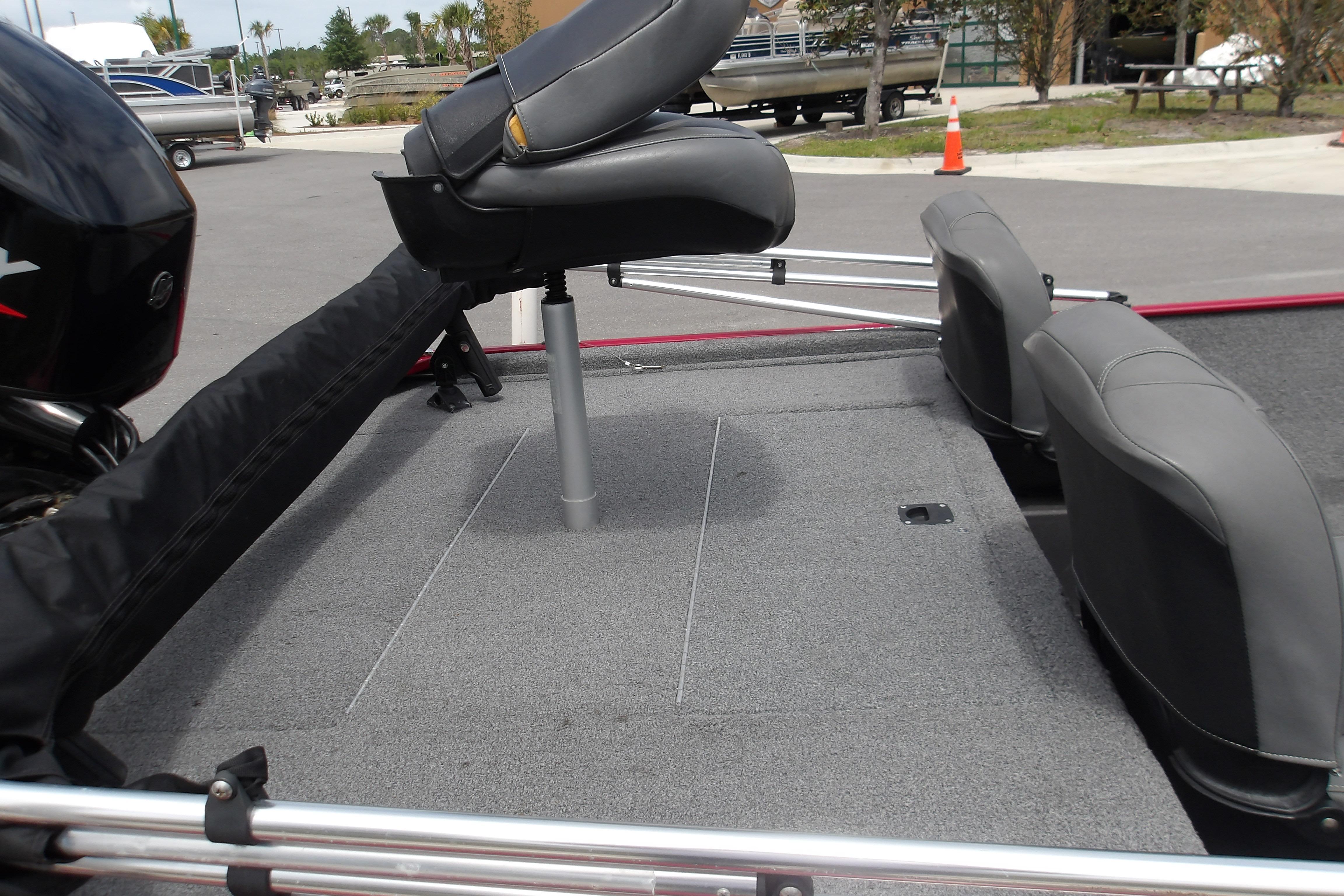 2024 Tracker Bass Tracker Classic XL boat interior with seating and carpeted deck.