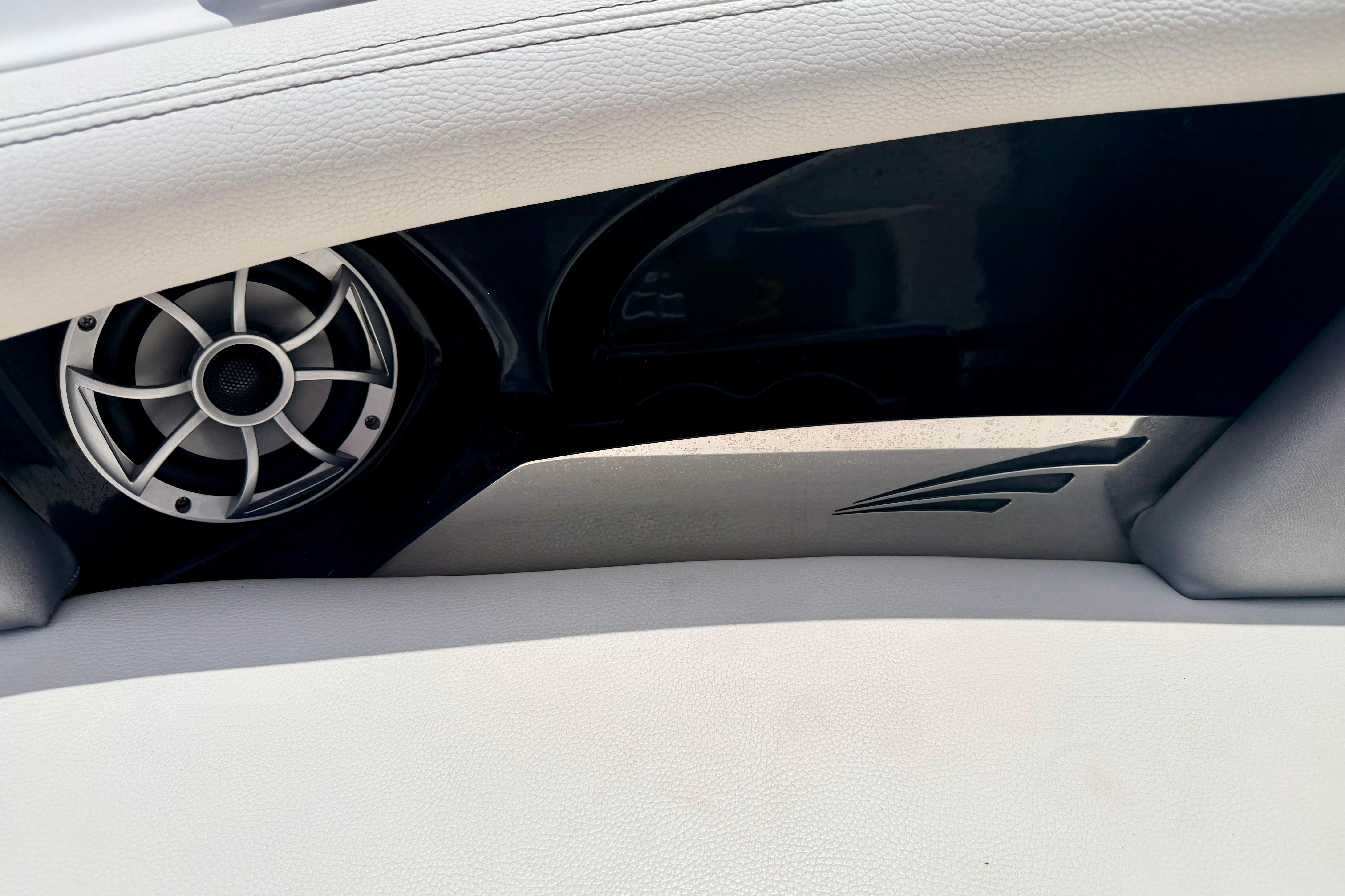 Interior speaker detail of 2014 Tigé R20 boat with sleek design elements.