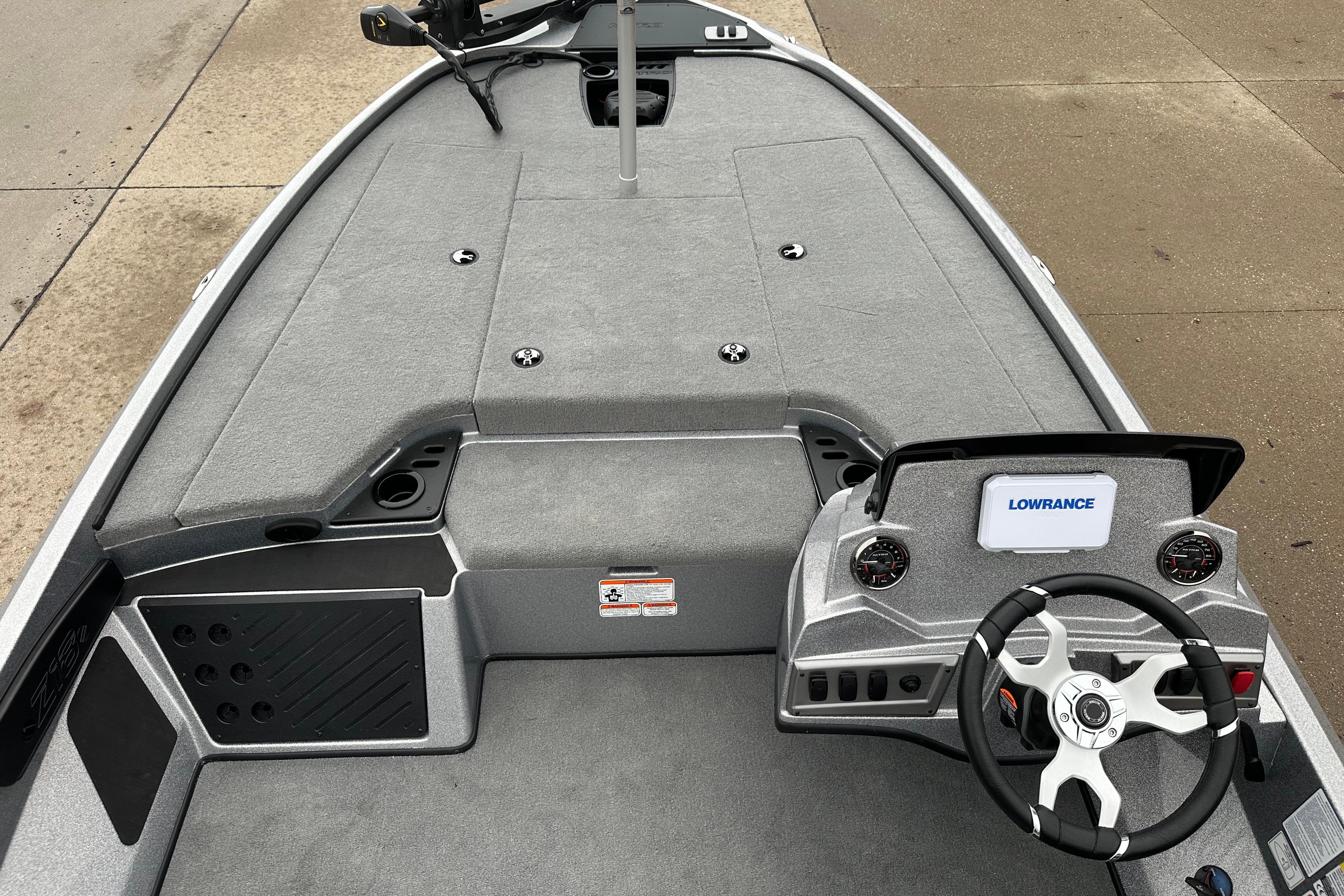 2026 Nitro Z18 boat interior with steering wheel and Lowrance display.