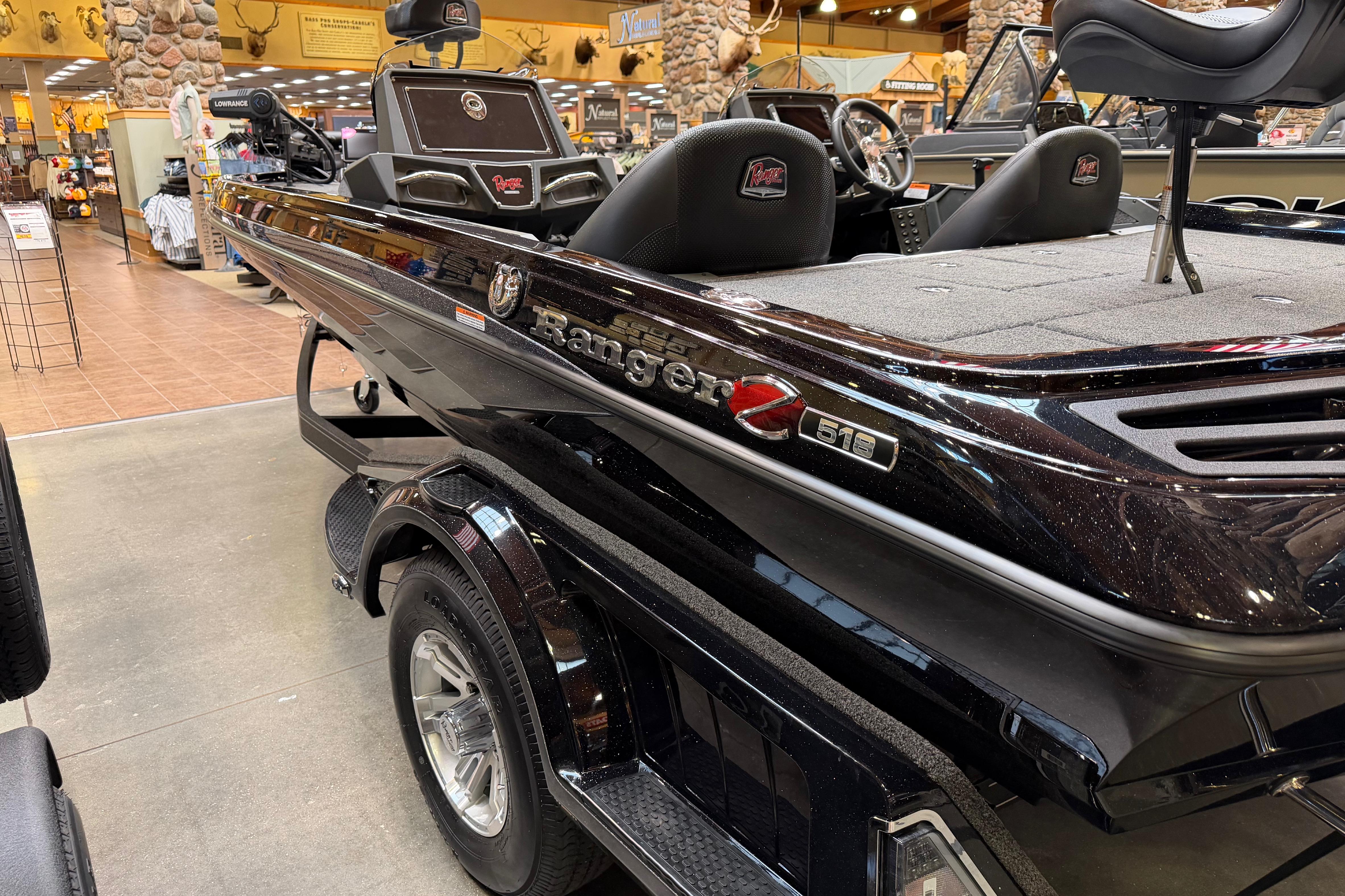 2026 Ranger Z518 boat displayed indoors, showcasing sleek design and modern features.