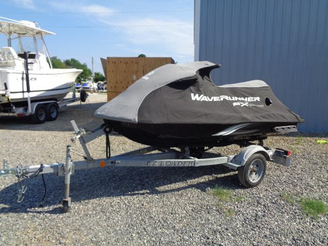 2015 Yamaha WaveRunner FX Cruiser H/O on trailer, covered, parked outdoors.