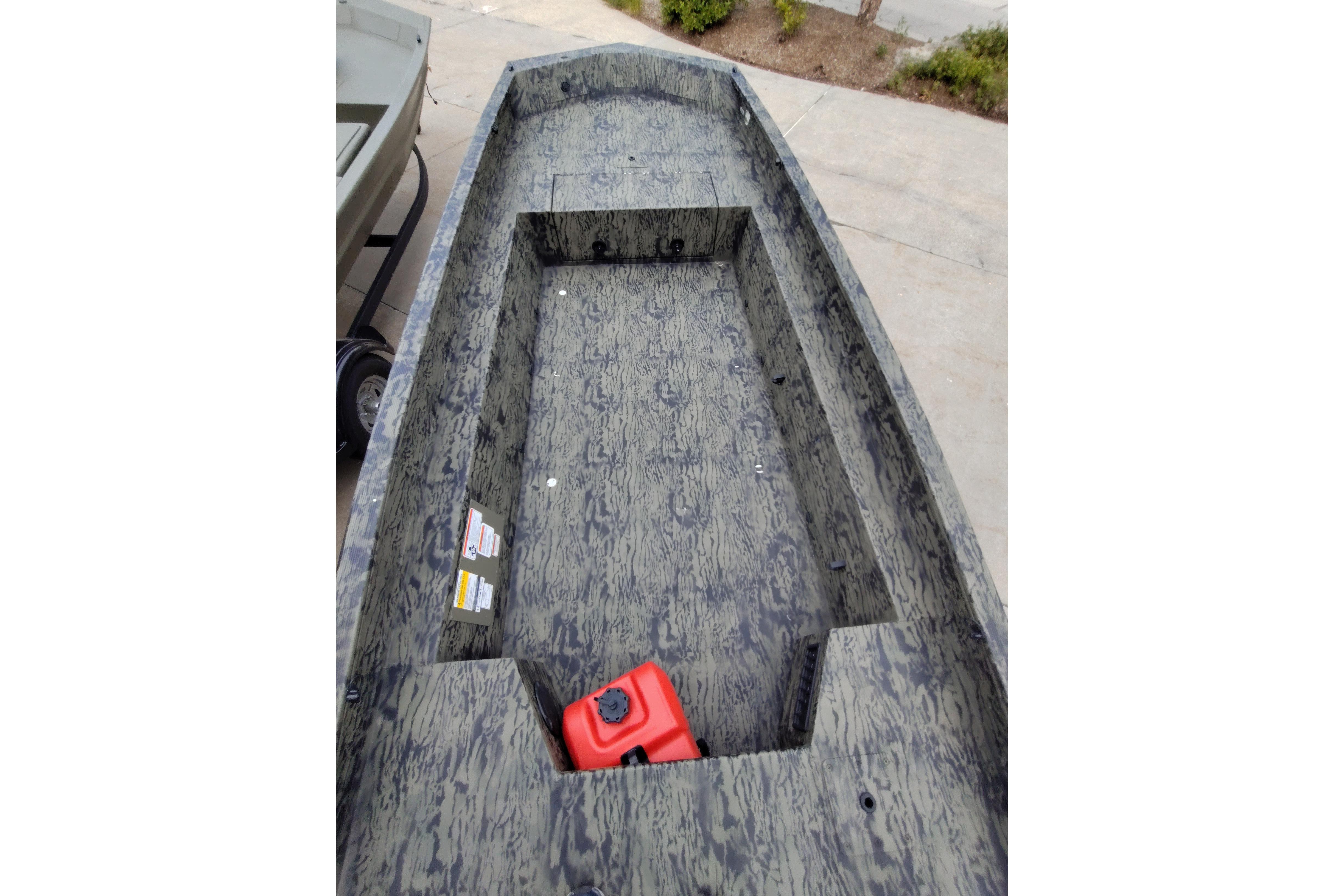 2026 Tracker Grizzly 1650 T Prairie Wings Edition boat interior with camouflage design.