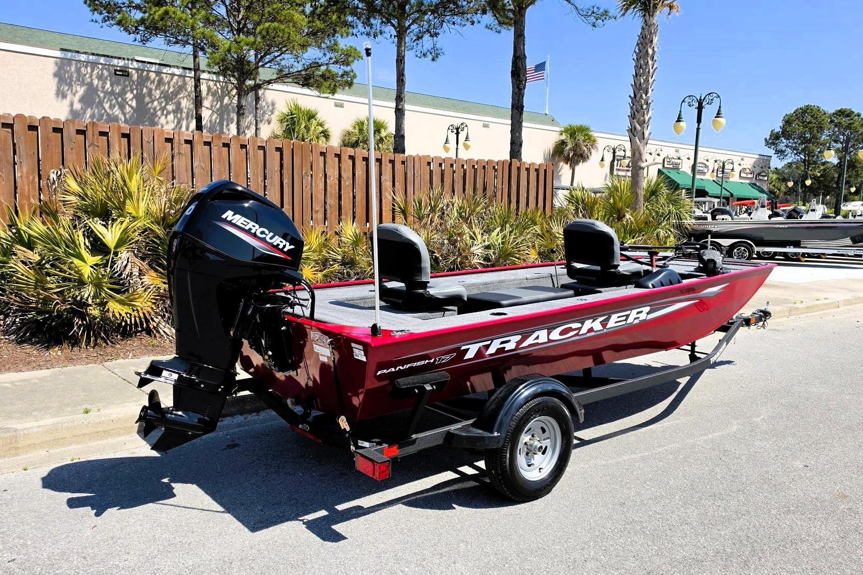 2026 Tracker Panfish 17 boat with Mercury engine, parked outdoors on a sunny day.