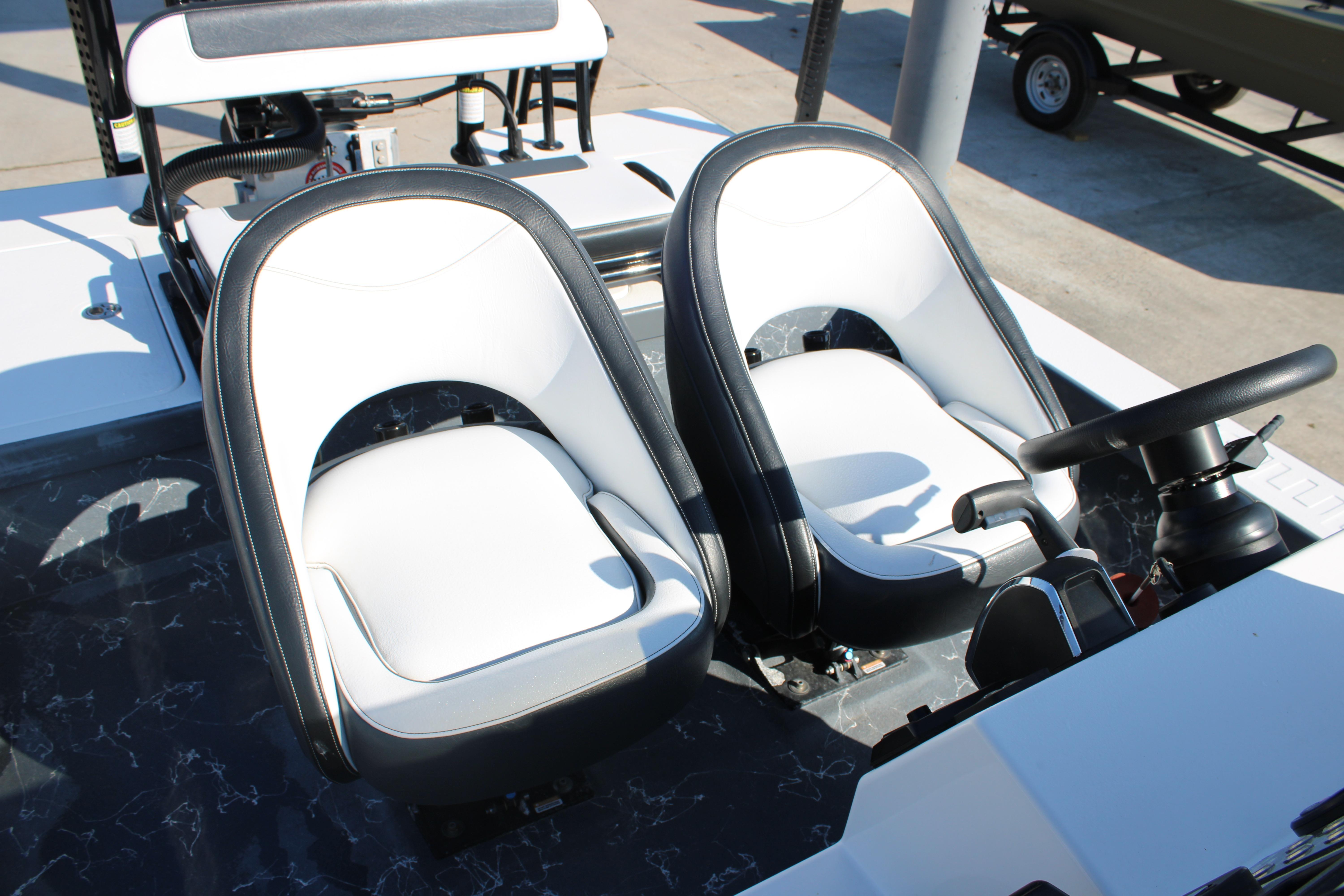 2023 Mamba 24VX boat interior with dual white and black seats.