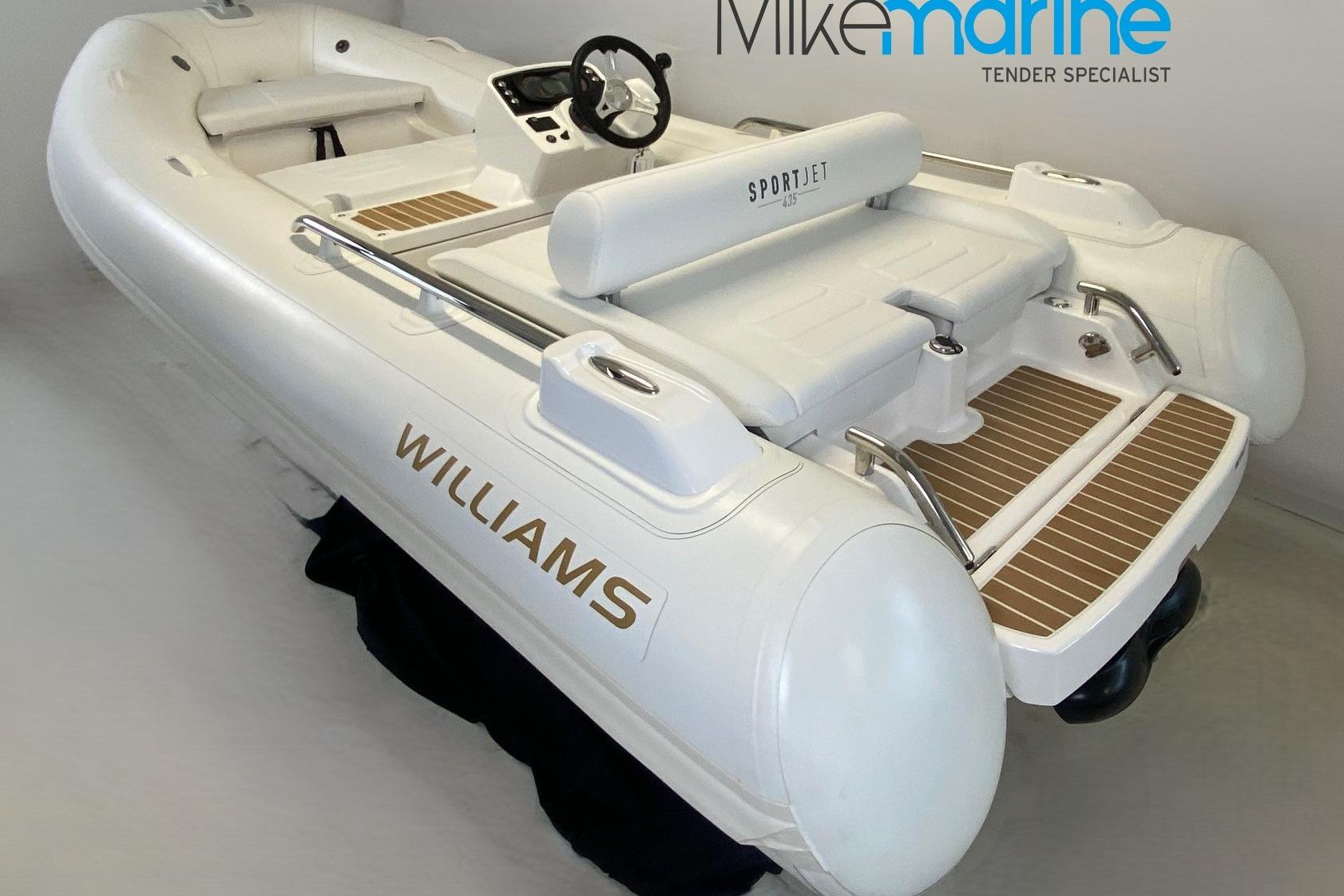 2025 Williams Jet Tenders Sportjet 435, white luxury tender boat in showroom.