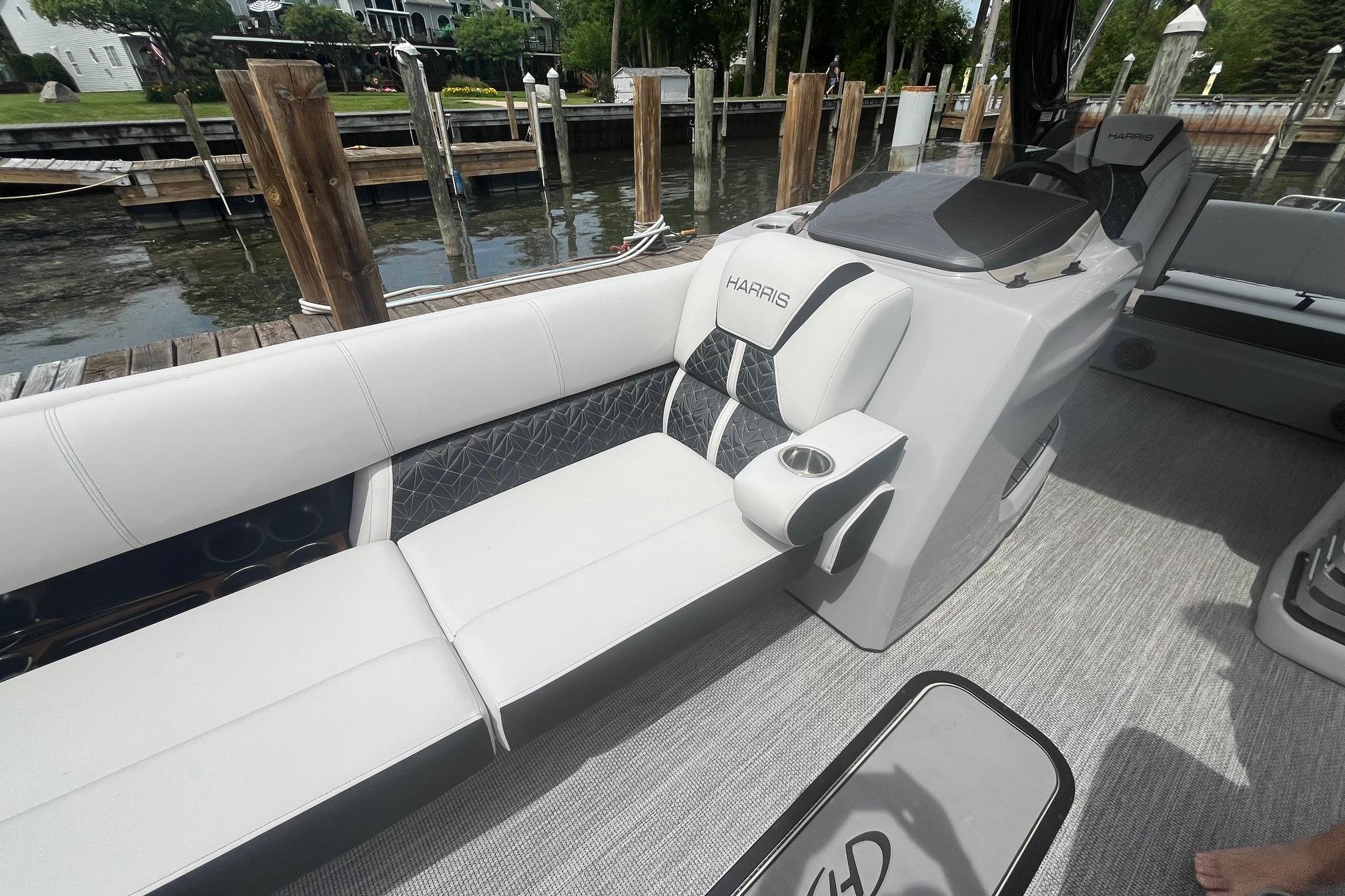 2024 Harris Grand Mariner 250 boat interior with luxurious seating and modern design.