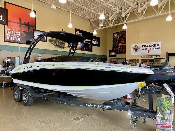 2023 Tahoe 210 Si Limited boat on display in showroom.