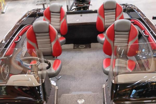 2025 Ranger 1880MS boat interior with red and gray seating, showcasing modern design.