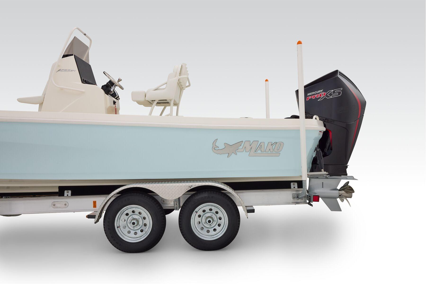 2026 Mako 24 APEX boat on trailer with Mercury Pro XS engine.