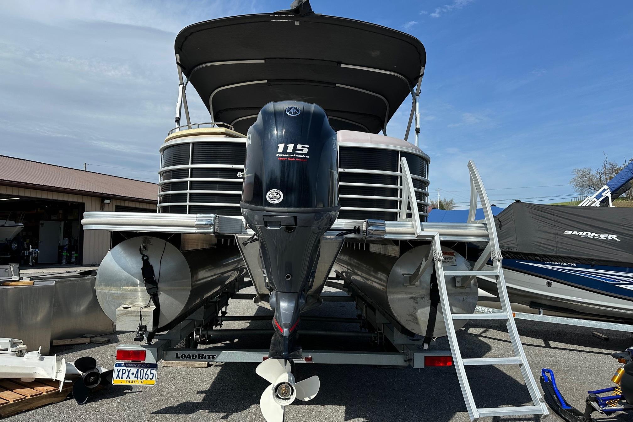 2017 Bennington 22 GPD pontoon boat with Yamaha 115 engine on trailer.