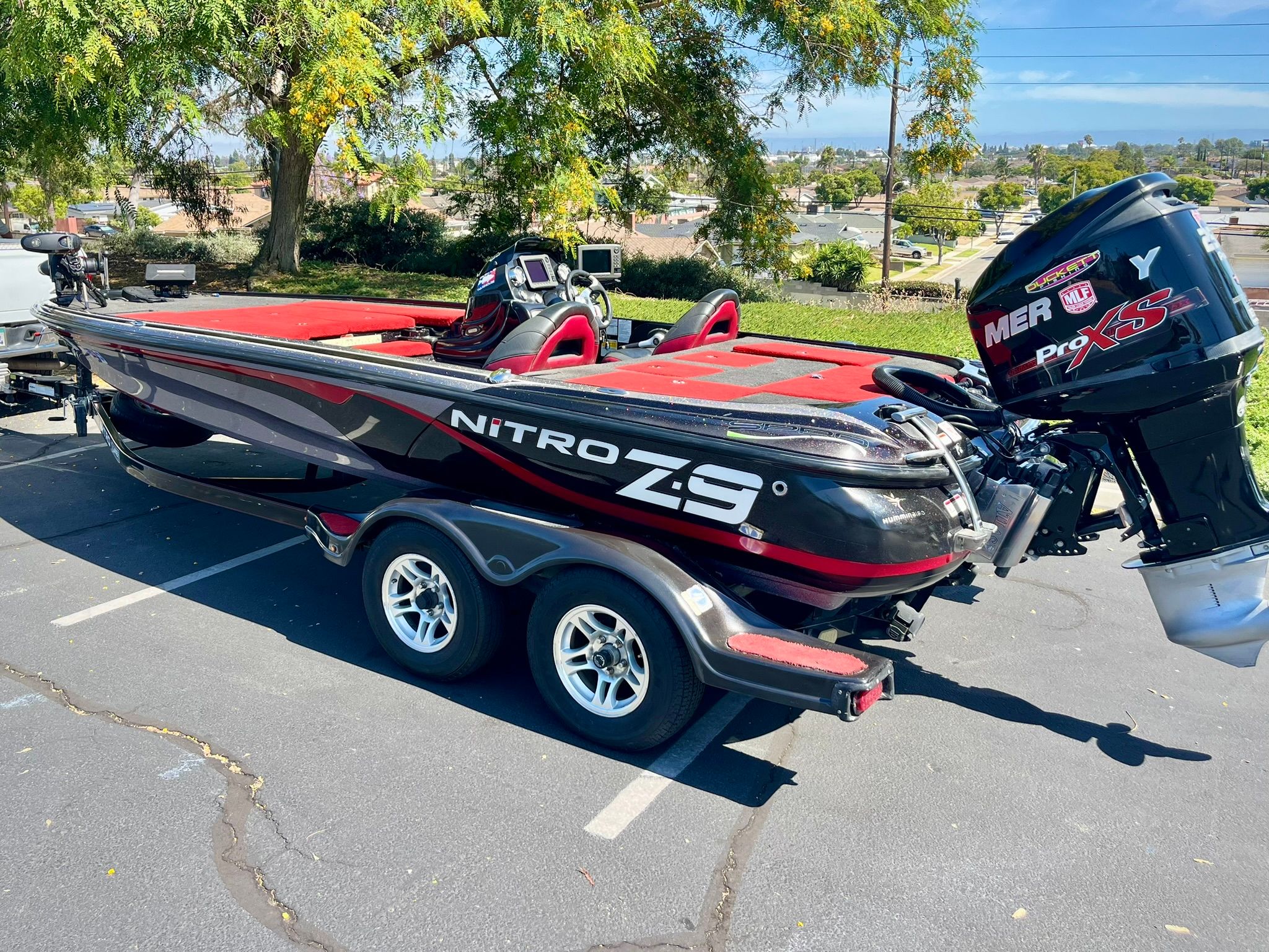 2013 Nitro Z-9 boat parked outdoors on a trailer.