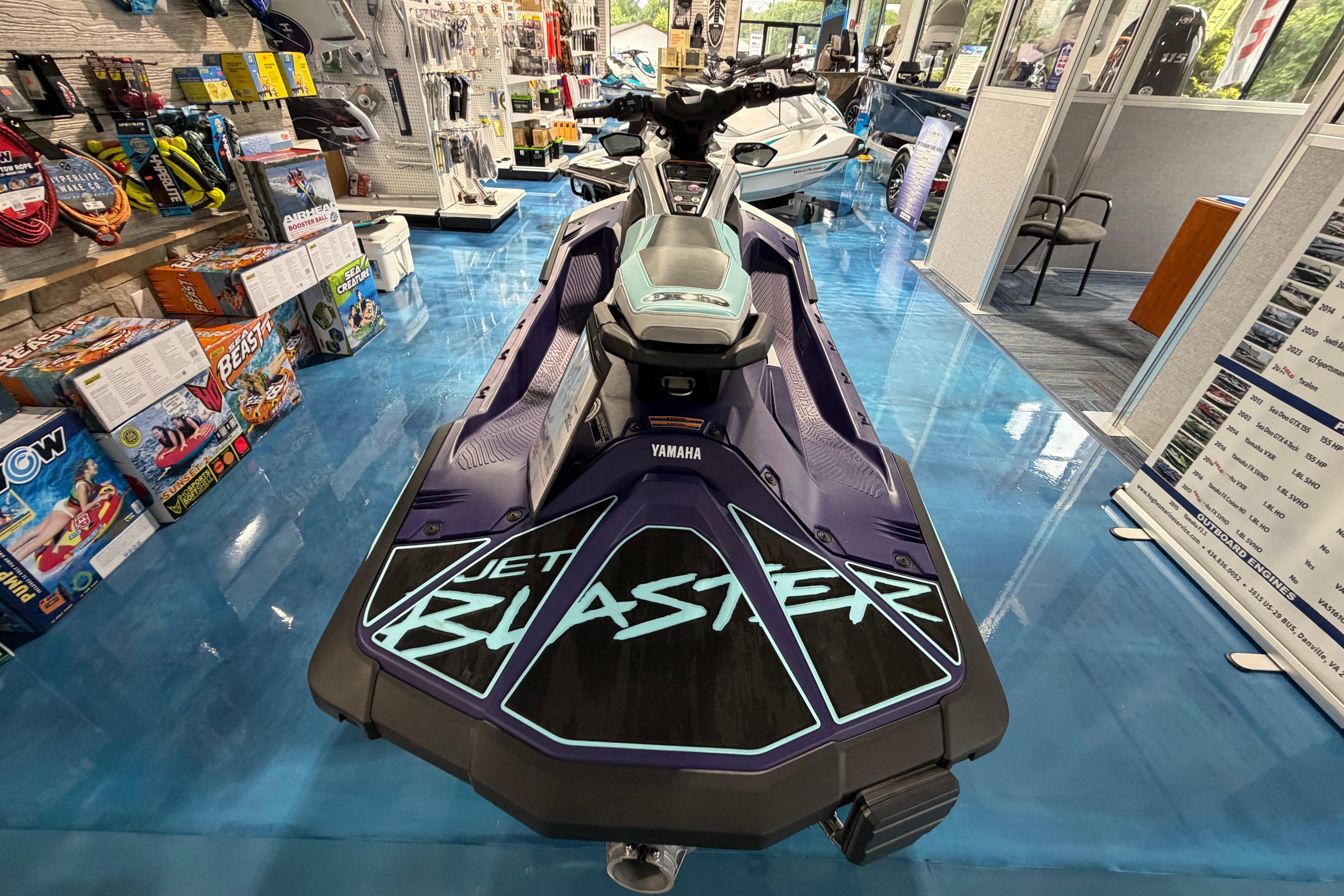 2025 Yamaha WaveRunner JetBlaster displayed in a showroom with accessories.