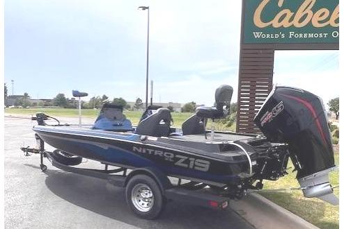 2026 Nitro Z19 XL boat parked outside Cabela's store.