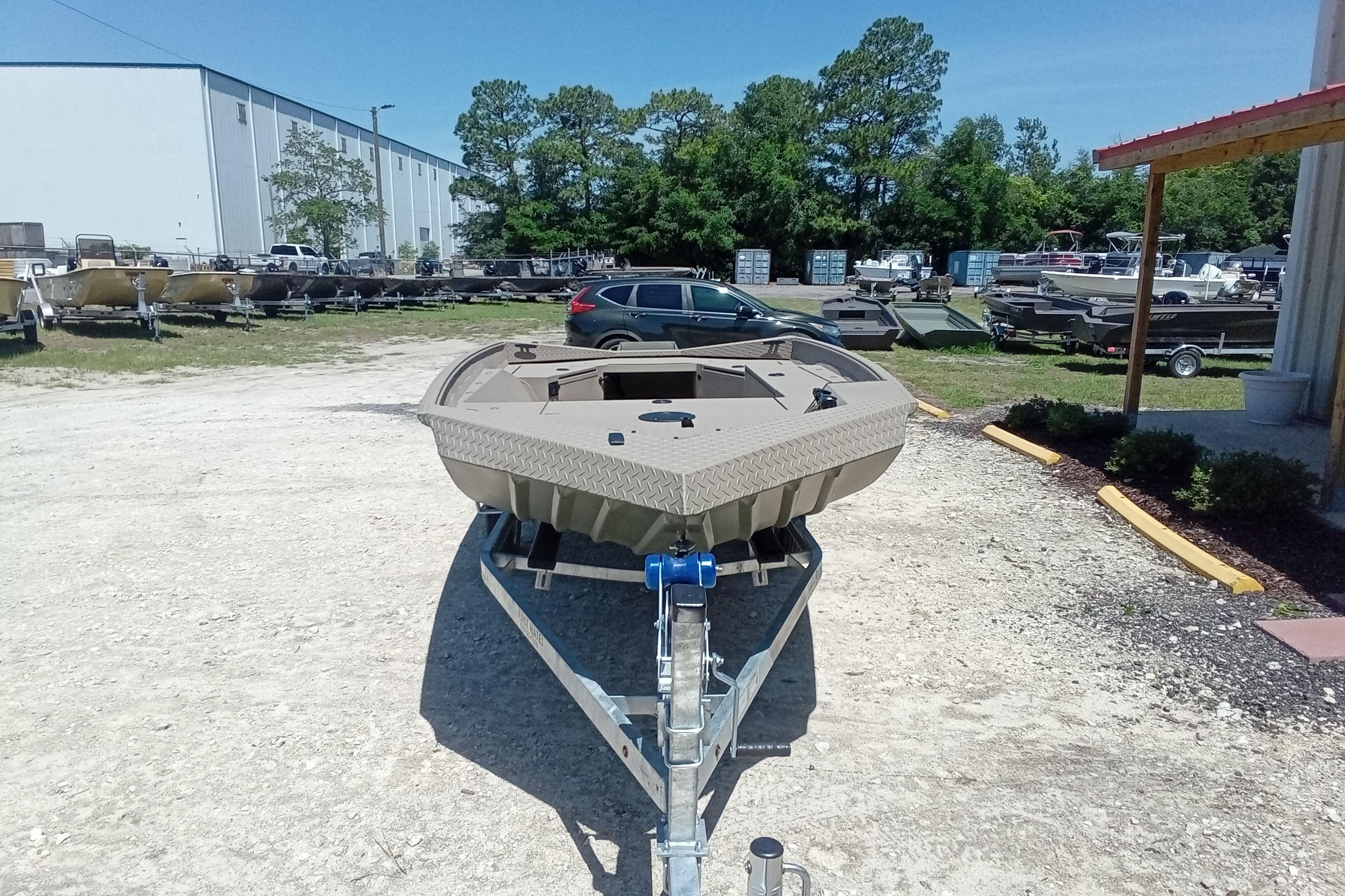 2026 Alweld 1652 Invader boat on trailer in outdoor dealership lot.