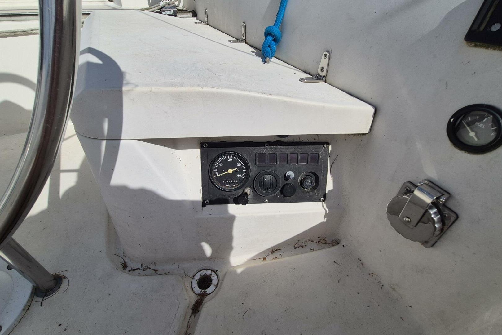 Control panel on a 1984 Mirage Yachts 35 sailboat cockpit.