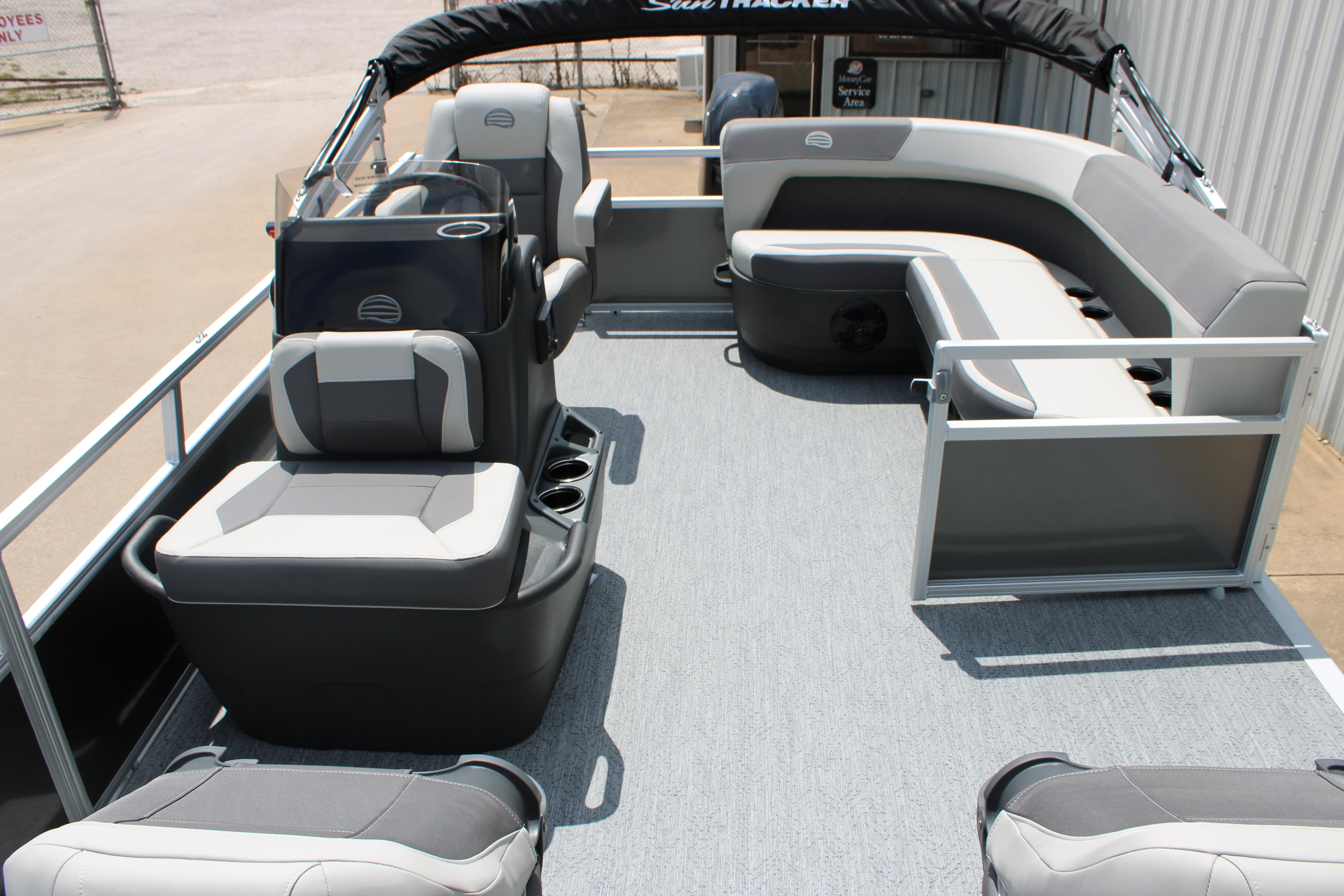 2026 Sun Tracker Bass Buggy 16 XL Select pontoon boat interior with seating and helm.