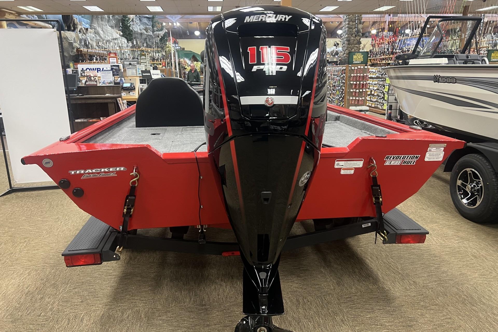 2026 Tracker Pro Team 190 boat with Mercury 115 Pro motor in showroom.