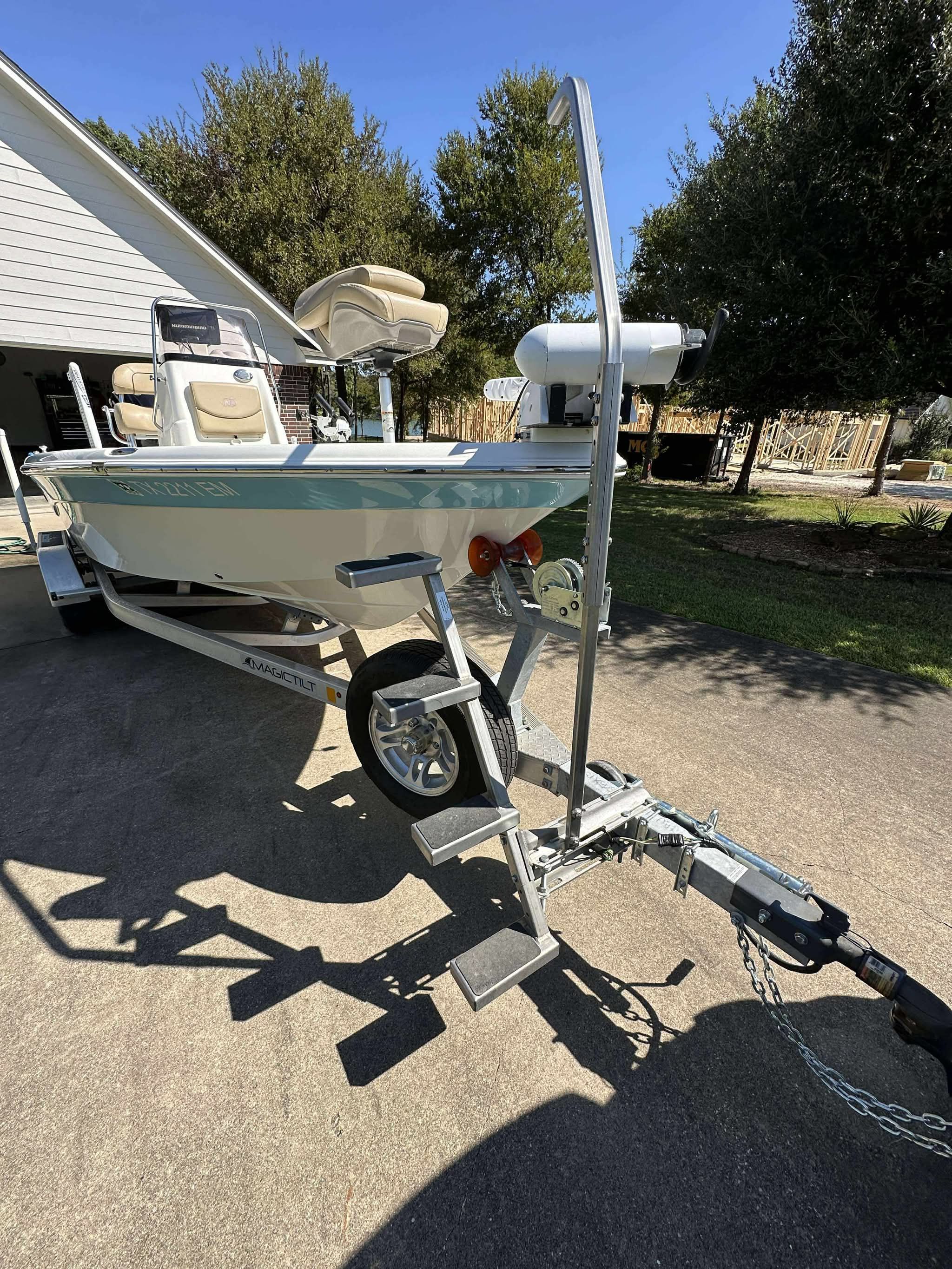 2019 NauticStar 215 XTS Shallow Bay boat on trailer.